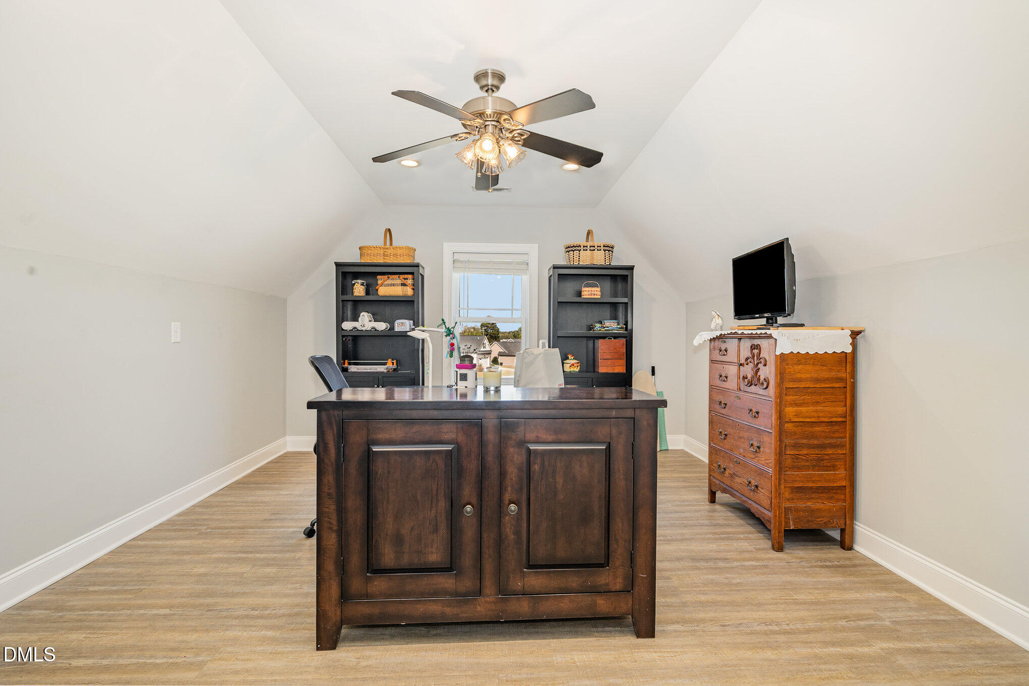 17 Kiowa Court Willow Spring, NC 27592 - Photo 18 of 27 a room with furniture and wooden floor