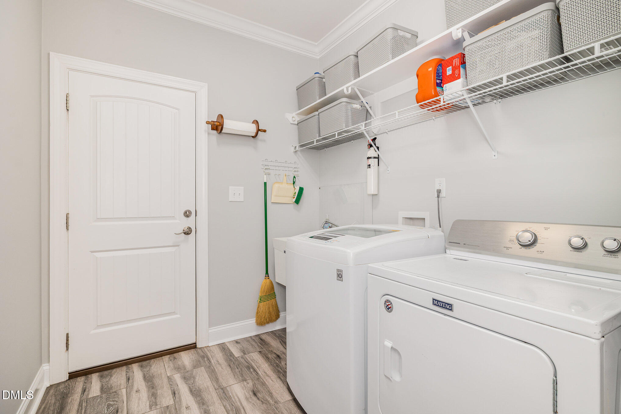 17 Kiowa Court Willow Spring, NC 27592 - Photo 20 of 27 a view of storage and utility room with washer and dryer
