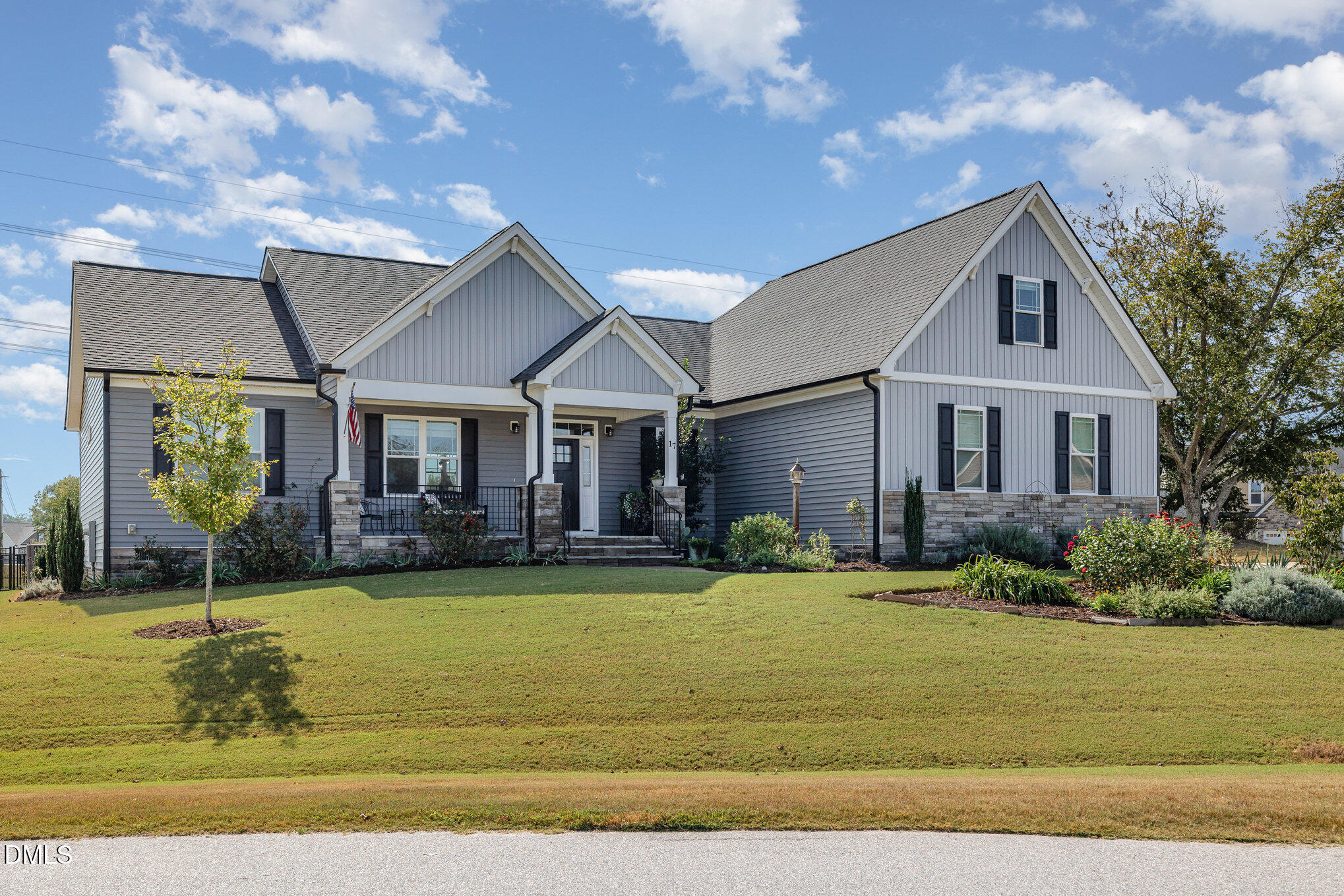 17 Kiowa Court Willow Spring, NC 27592 - Photo 2 of 27 a front view of a house with swimming pool having outdoor seating