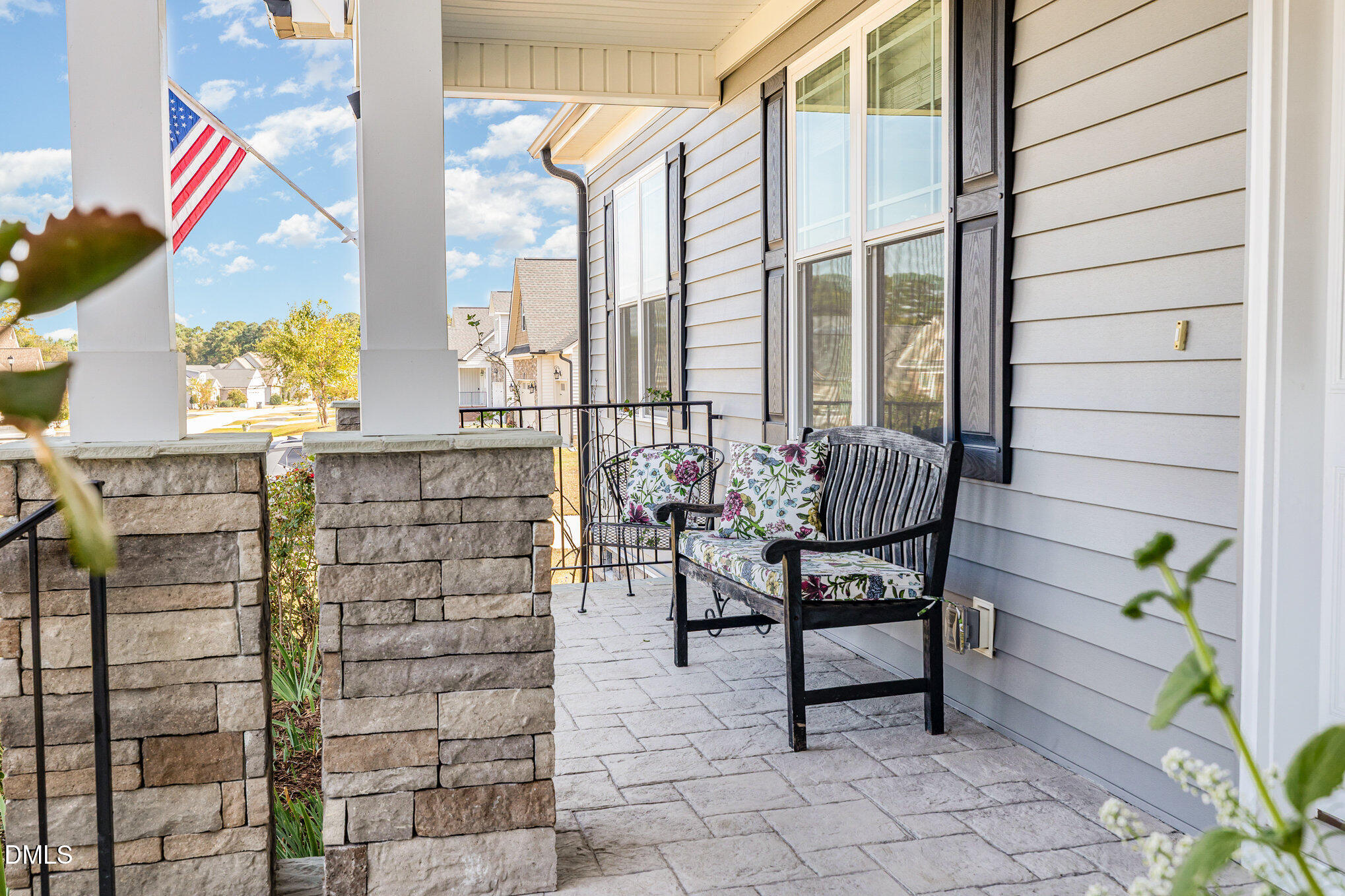 17 Kiowa Court Willow Spring, NC 27592 - Photo 3 of 27 a patio with table and chairs and potted plants