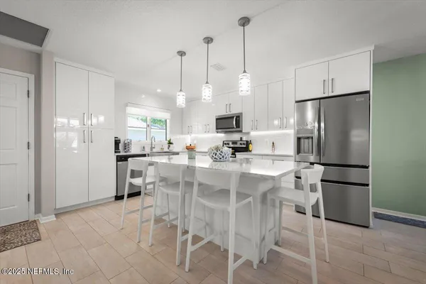 a view of a wooden floor in front of door