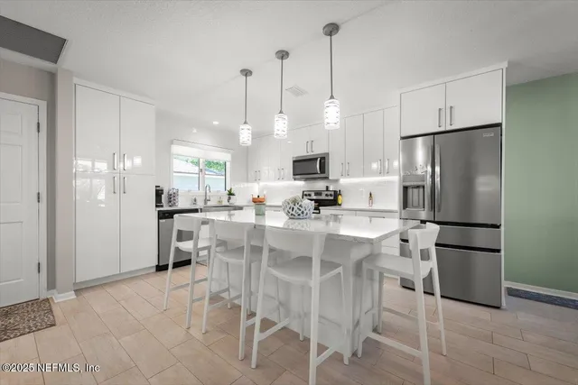 a view of a wooden floor in front of door
