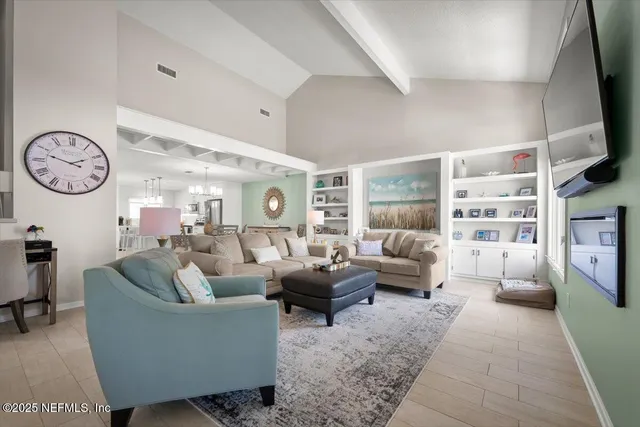 a view of a wooden deck with lake view