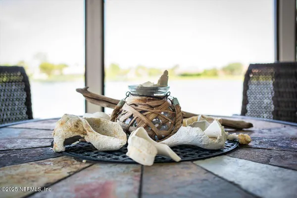 a bedroom with a bed and a lamp