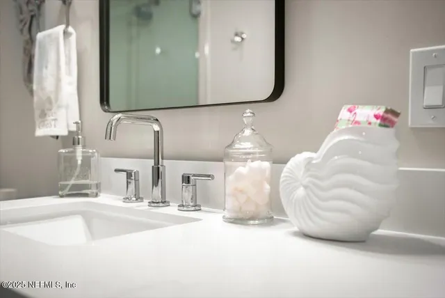 a spacious bedroom with a bed and a window