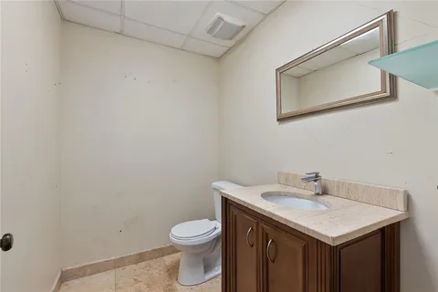a bathroom with a sink and a toilet