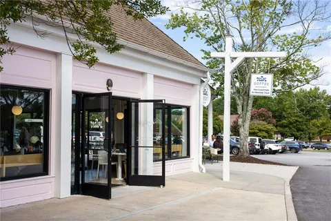 a view of street with sitting area