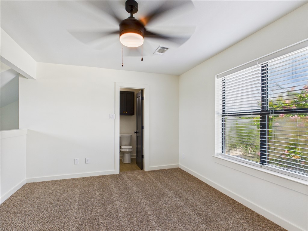 309 Mobile Avenue, Unit 5 Bryan, TX 77801 - Photo 12 of 17 a view of an empty room with a window