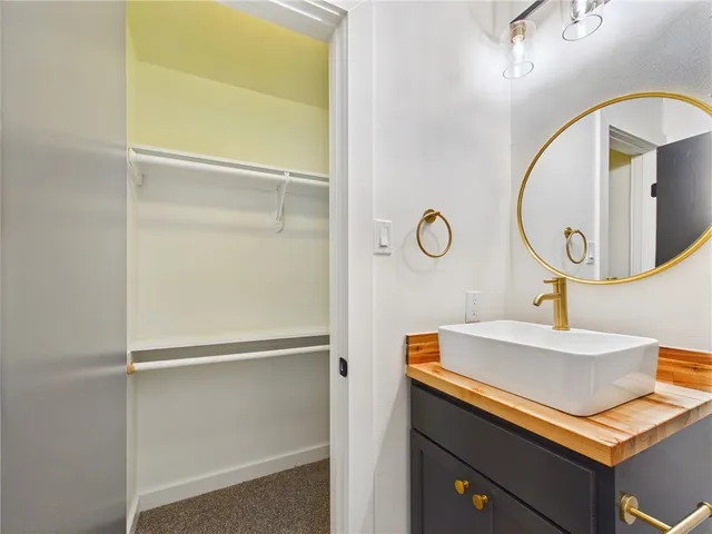a bathroom with a toilet and a bathtub