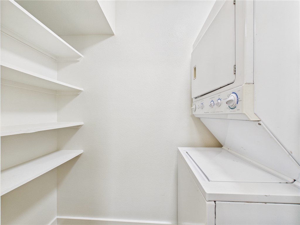 309 Mobile Avenue, Unit 5 Bryan, TX 77801 - Photo 9 of 17 a utility room with dryer and washer