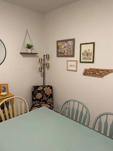 a bedroom with furniture and window