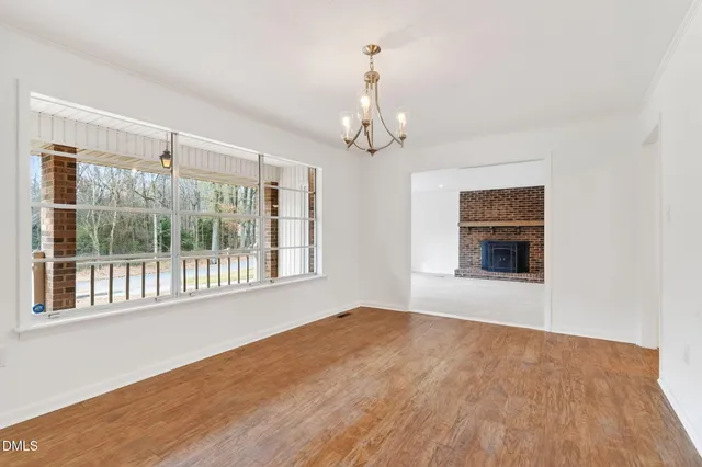 a kitchen with stainless steel appliances granite countertop a refrigerator stove a sink and microwave