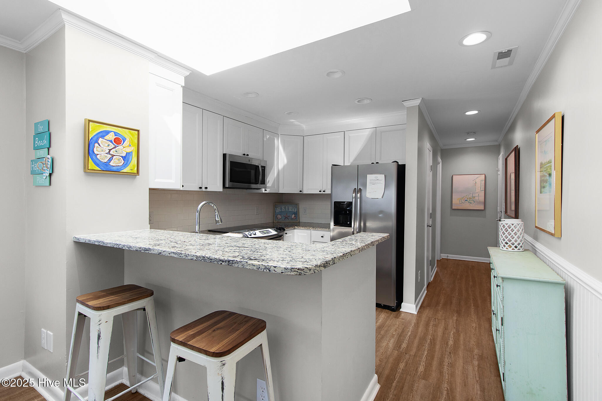 2111 West Fort Macon Road, Unit 336 DUNESCAPE Atlantic Beach, NC 28512 - Photo 14 of 43 Kitchen with gorgeous skylight
