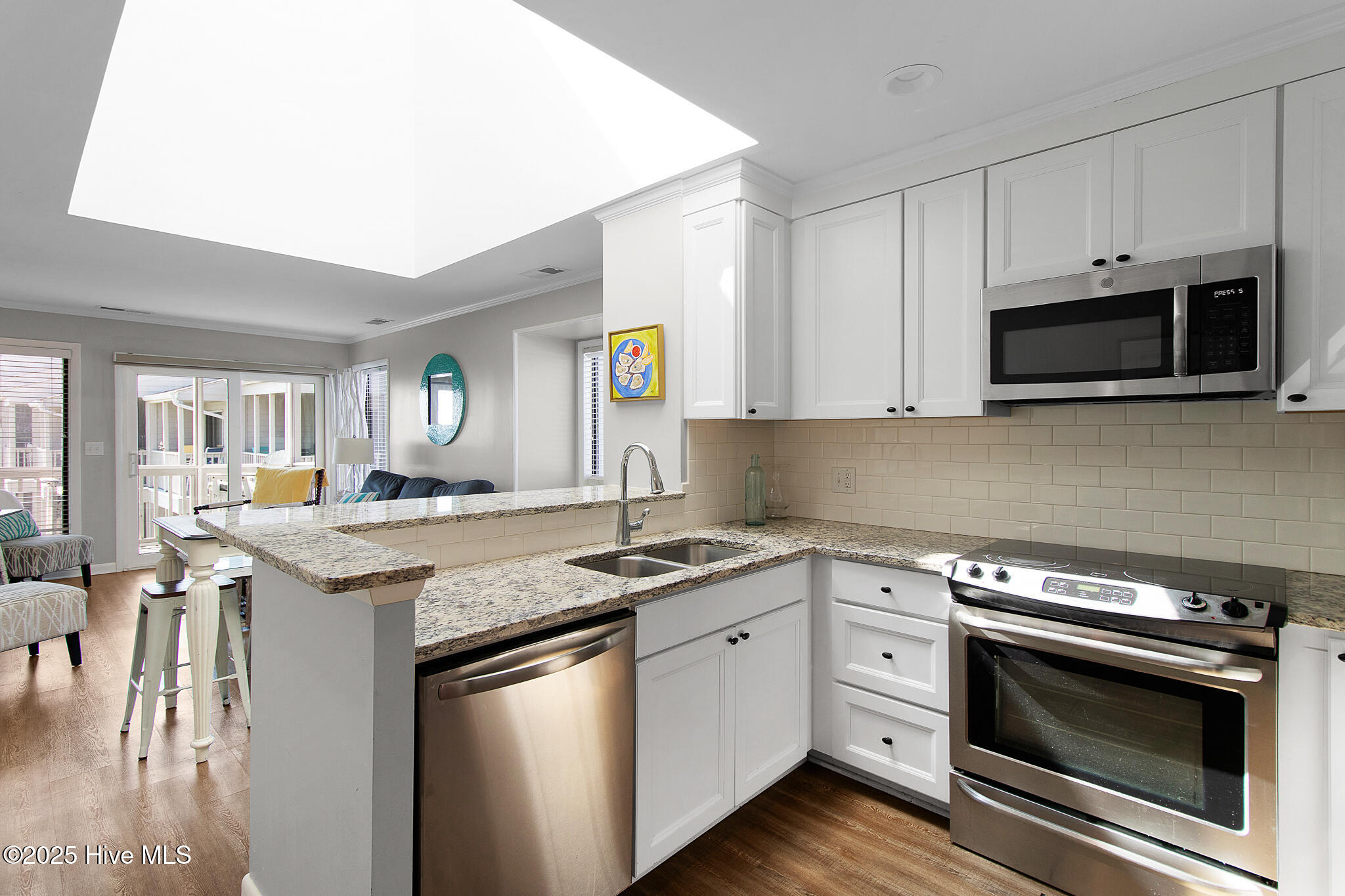 2111 West Fort Macon Road, Unit 336 DUNESCAPE Atlantic Beach, NC 28512 - Photo 15 of 43 Kitchen with gorgeous skylight
