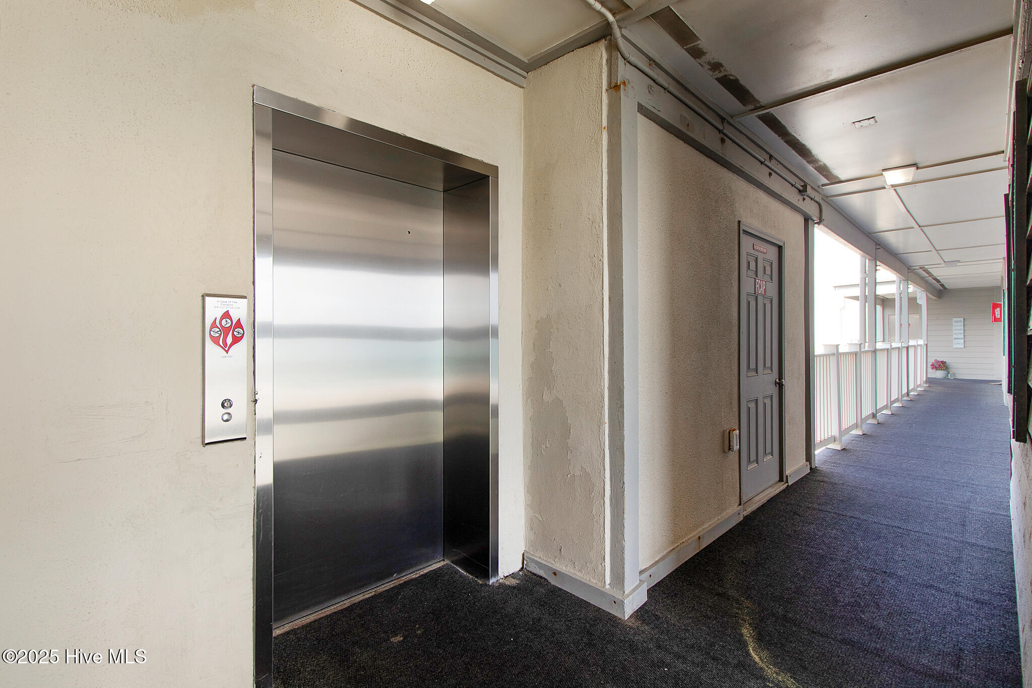 2111 West Fort Macon Road, Unit 336 DUNESCAPE Atlantic Beach, NC 28512 - Photo 37 of 43 Elevator in common area