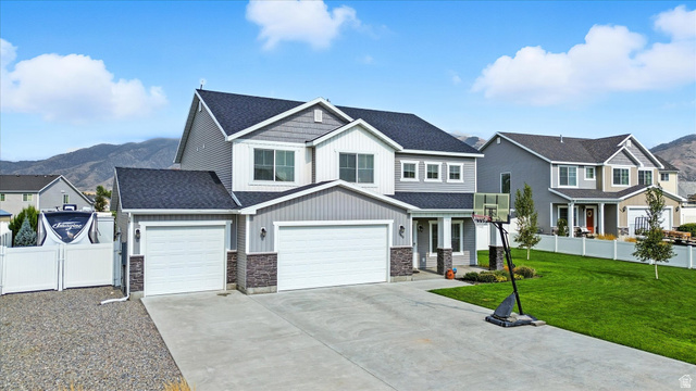 1055 West 2500th Street South Logan, UT 84321 - Photo 39 of 53 3 car garage with RV parking