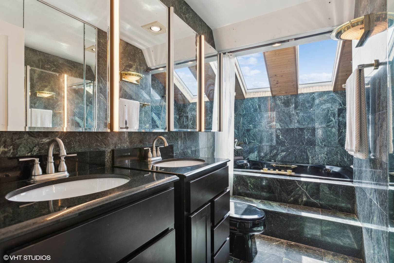 459 Simone Drive Des Plaines, IL 60016 - Photo 12 of 23 a bathroom with a sink and a mirror