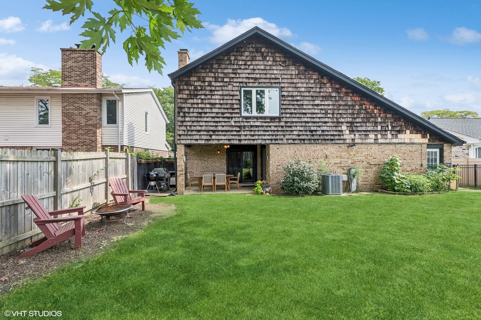 459 Simone Drive Des Plaines, IL 60016 - Photo 19 of 23 a view of a house with a yard and sitting area