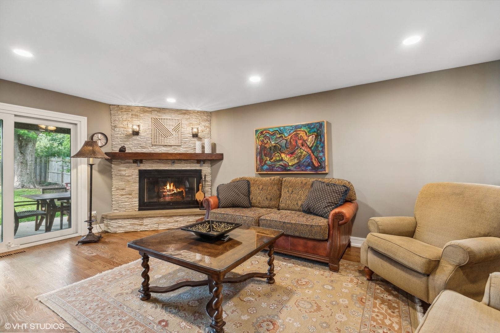 459 Simone Drive Des Plaines, IL 60016 - Photo 8 of 23 a living room with furniture and a fireplace