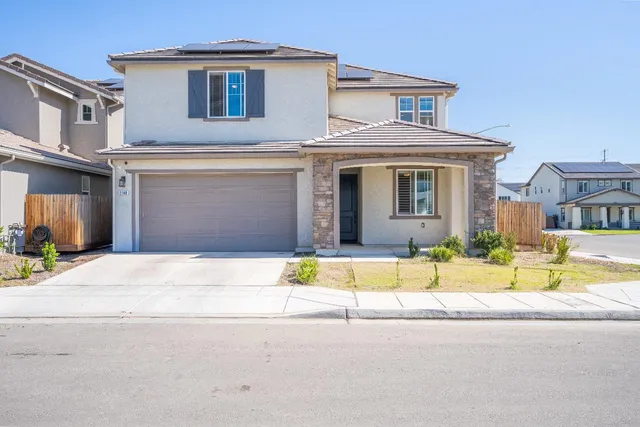 a house view with a outdoor space