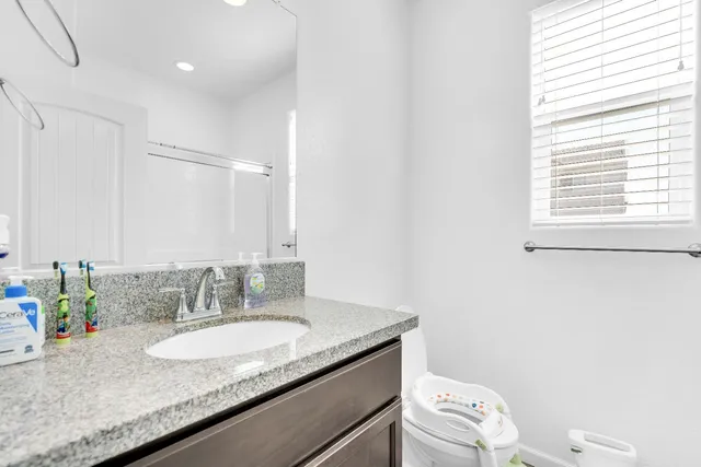 a view of hallway with windows