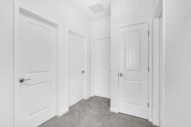 a bathroom with a granite countertop sink and a mirror with toilet