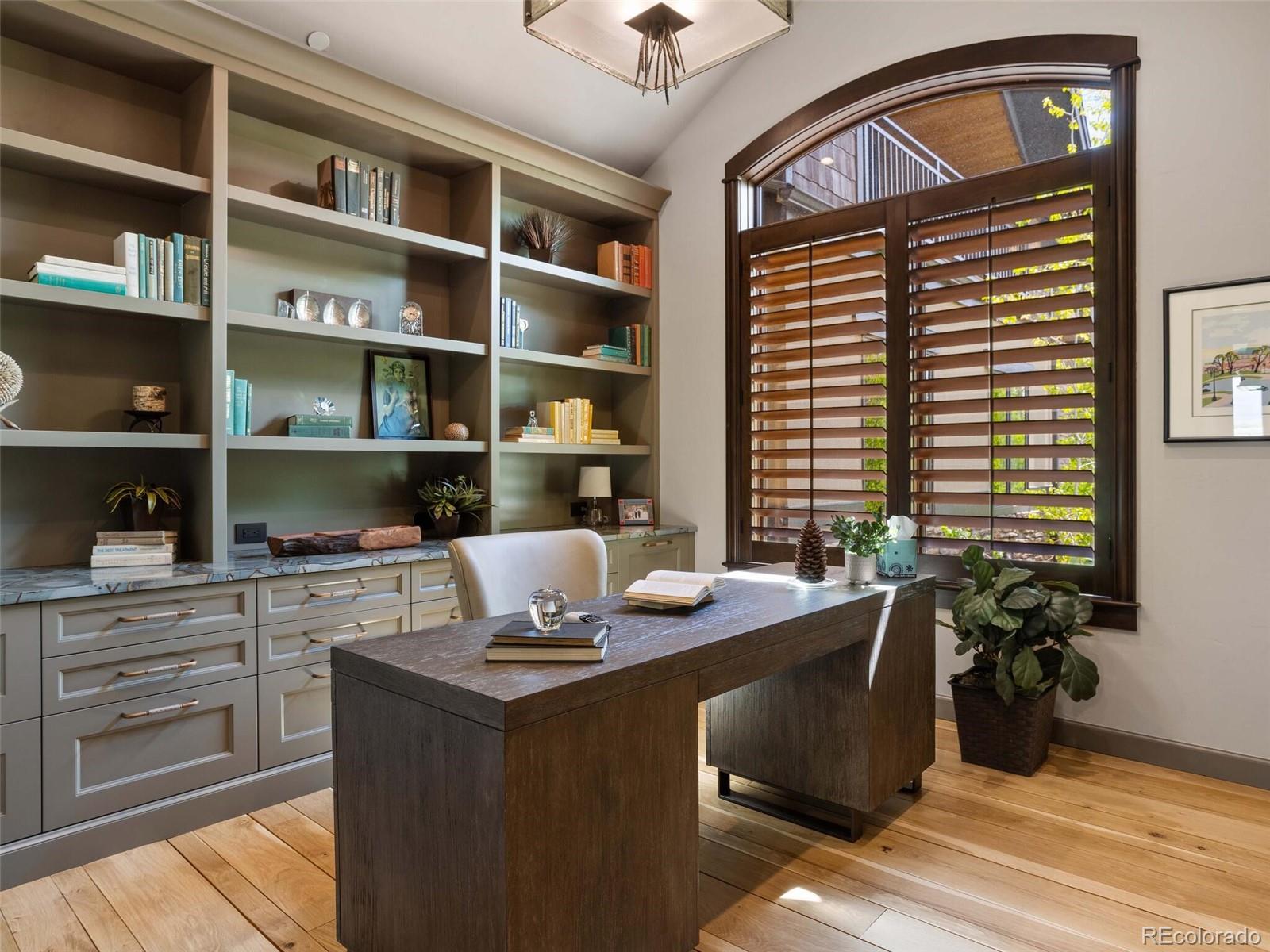 1395 Waverton Ranch Road Castle Rock, CO 80109 - Photo 22 of 40 a room with a workspace