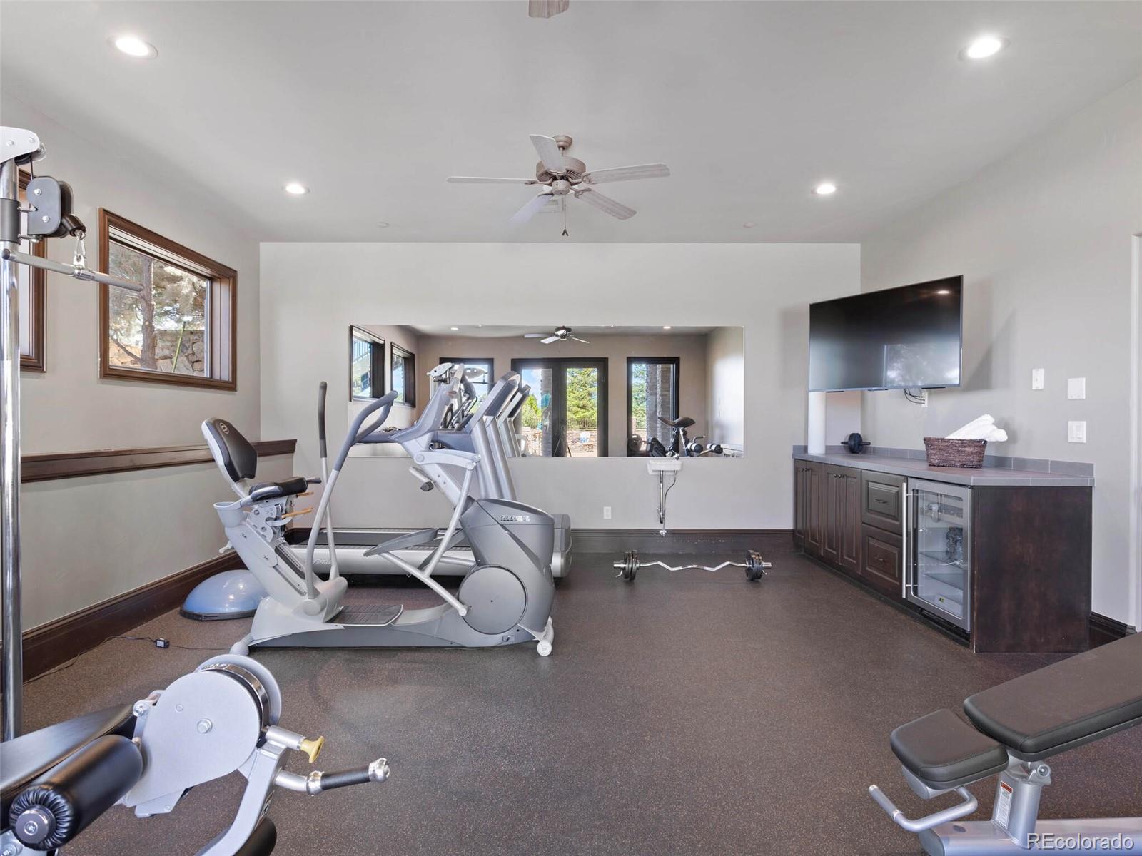 1395 Waverton Ranch Road Castle Rock, CO 80109 - Photo 27 of 40 a living room with furniture