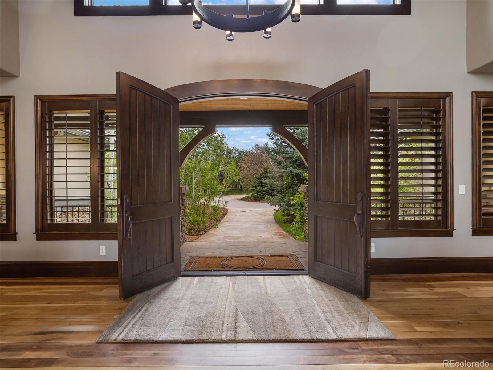 1395 Waverton Ranch Road Castle Rock, CO 80109 - Photo 9 of 40 a view of entrance door of the house
