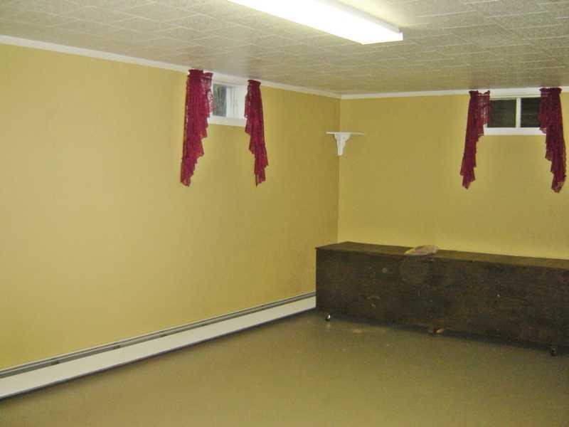 18 Caron Road St. David, ME 04773 - Photo 20 of 23 Den/Family/Great Room. Downstairs