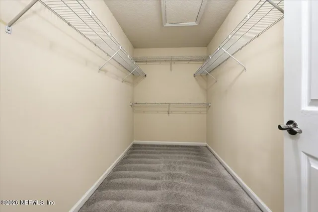 a view of a room with racks on the wall