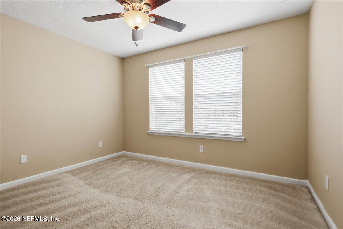 148 Paradas Place St. Augustine, FL 32092 - Photo 14 of 24 a view of an empty room with a window