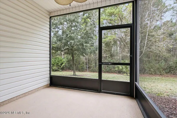 a view of a room with a large window