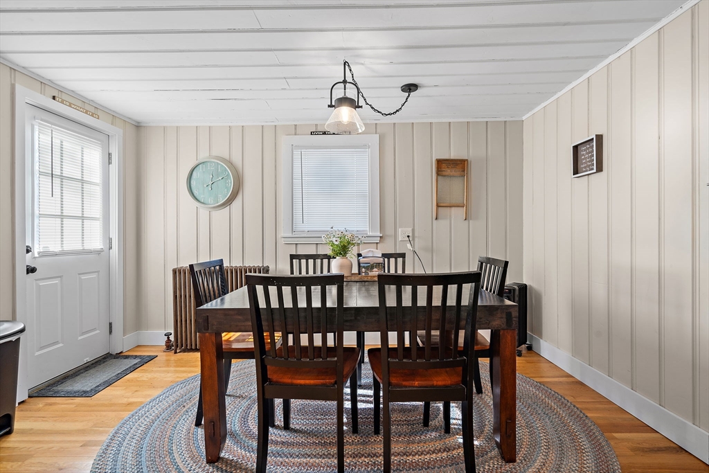 1190 Liberty Square Road Boxborough, MA 01719 - Photo 14 of 24 a view of a dining room with furniture and wooden floor