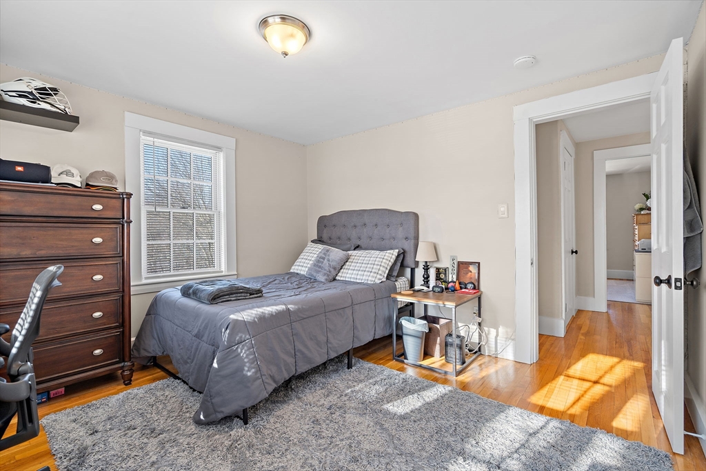 1190 Liberty Square Road Boxborough, MA 01719 - Photo 17 of 24 a bedroom with a bed and a tv