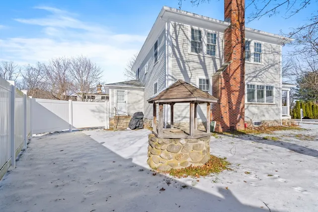 a street view with large trees