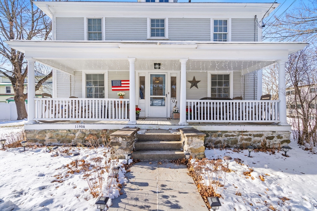 1190 Liberty Square Road Boxborough, MA 01719 - Photo 4 of 24 a front view of a house with a bench