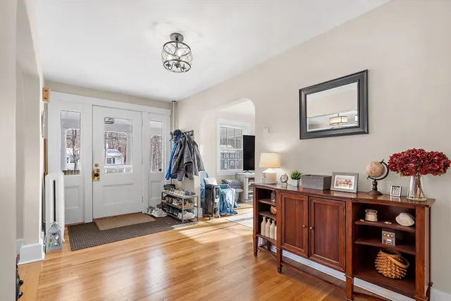 a view of livingroom with furniture and workspace