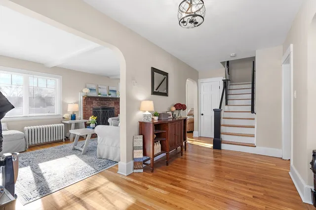 a view of a livingroom with furniture and a flat screen tv