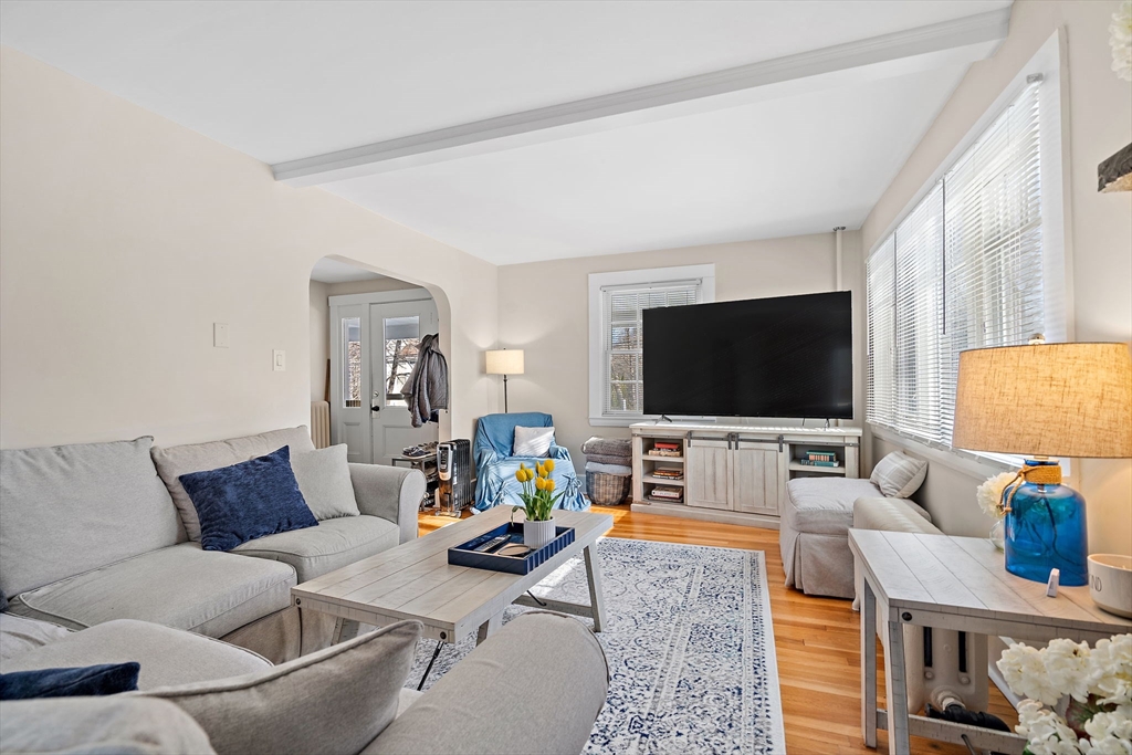 1190 Liberty Square Road Boxborough, MA 01719 - Photo 8 of 24 a living room with furniture and a flat screen tv