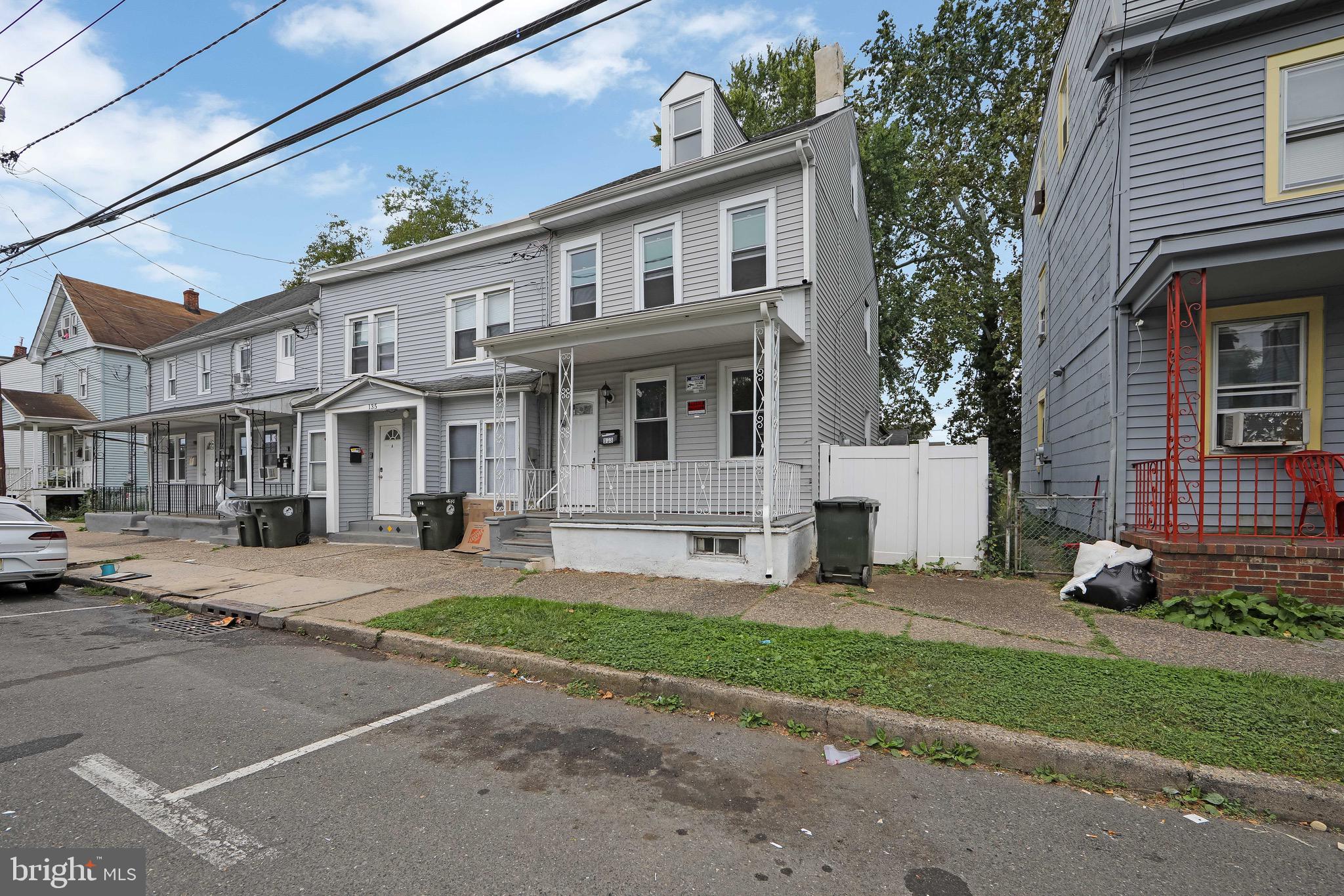 133 East Federal Street Burlington, NJ 08016 - Photo 2 of 43 a front view of a house with a yard and garage