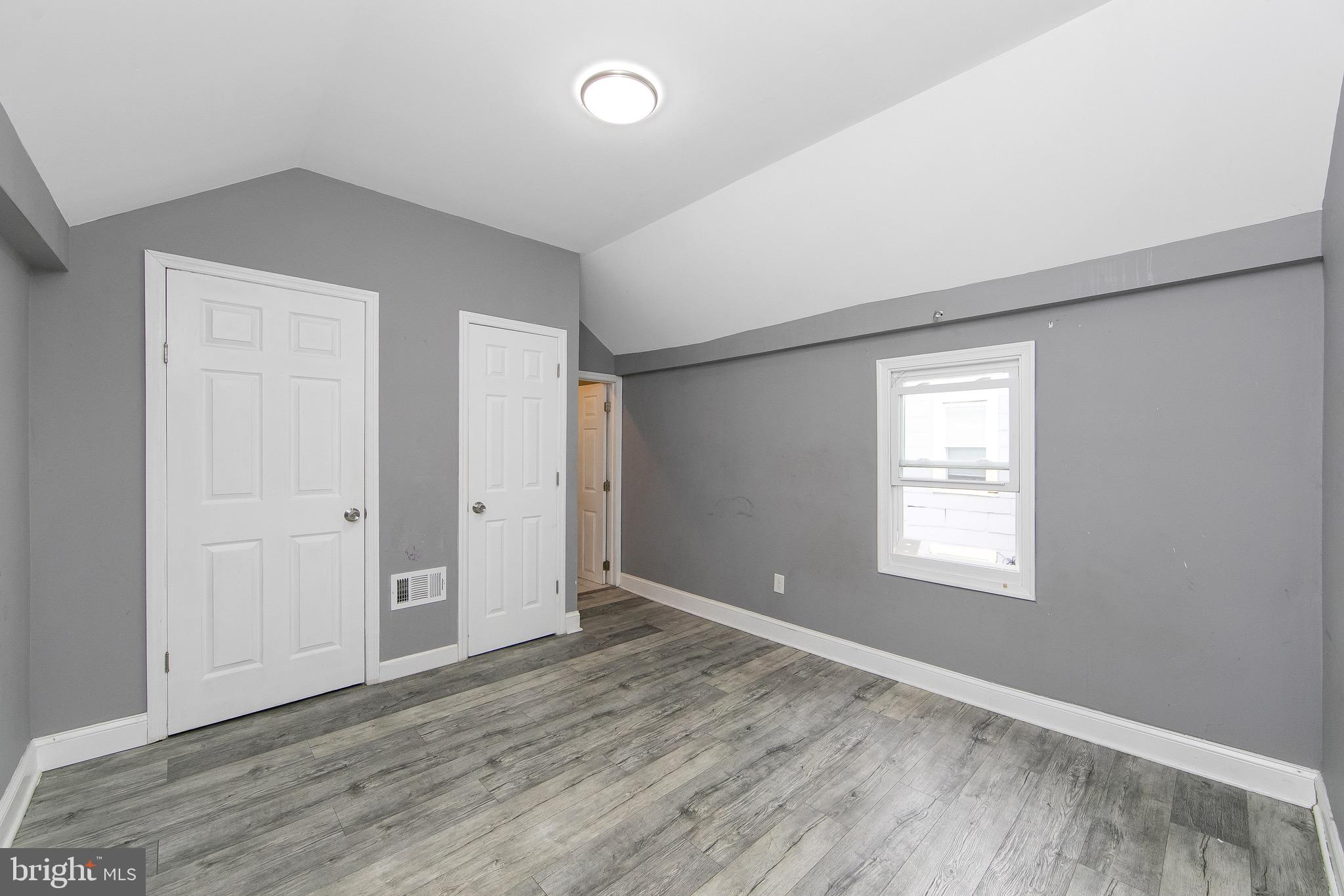 133 East Federal Street Burlington, NJ 08016 - Photo 23 of 43 a view of an empty room with wooden floor and a window