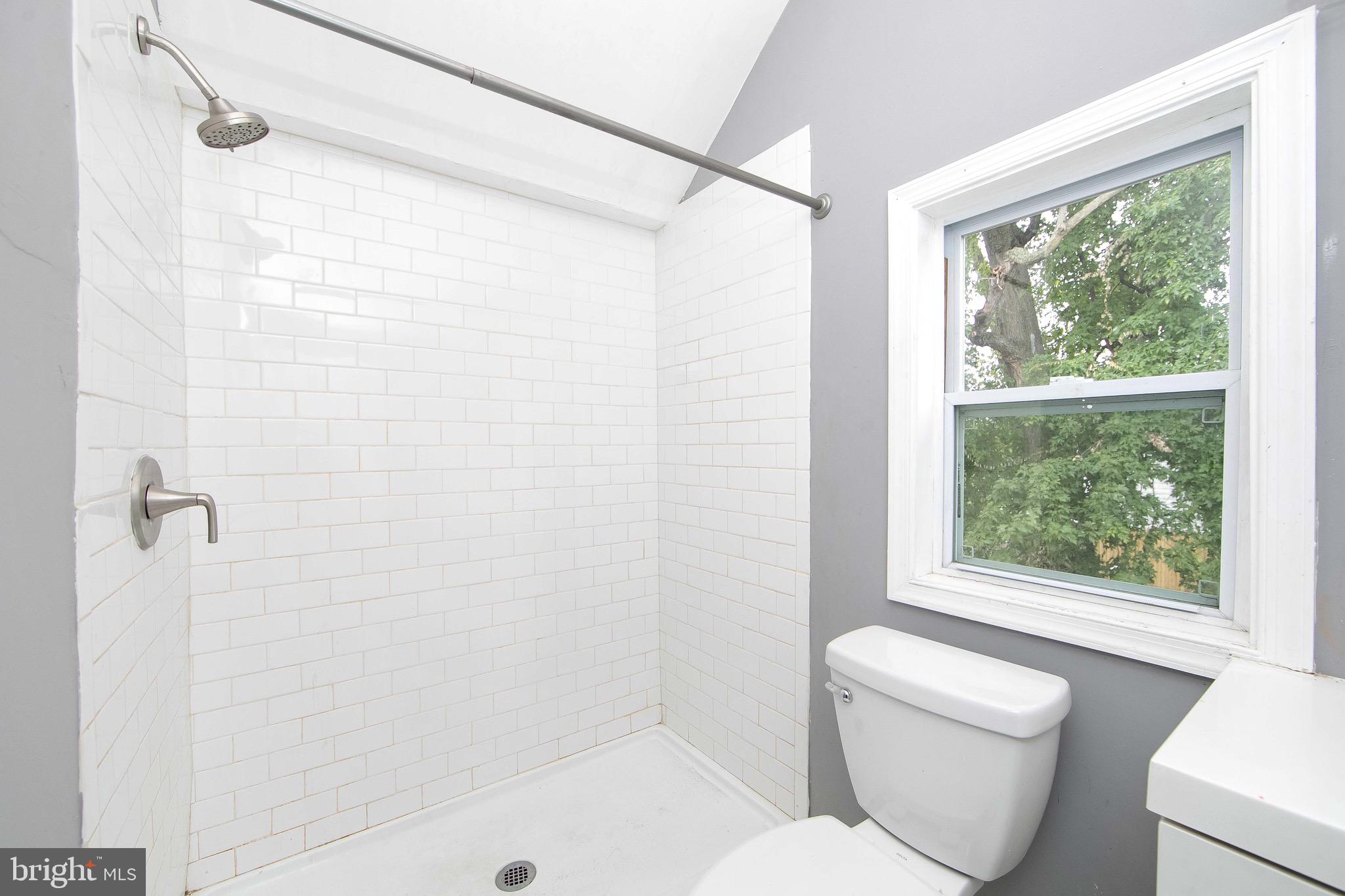 133 East Federal Street Burlington, NJ 08016 - Photo 27 of 43 a bathroom with a toilet and a shower