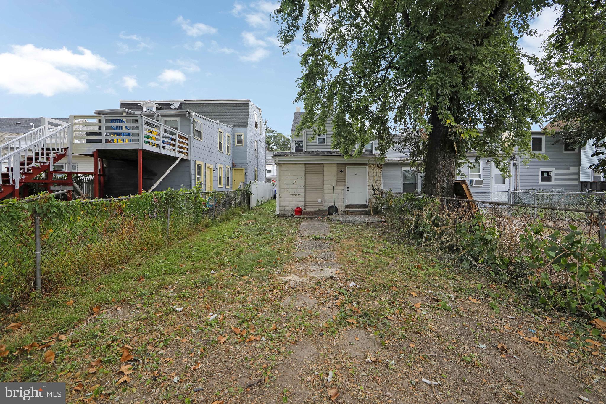 133 East Federal Street Burlington, NJ 08016 - Photo 39 of 43 a view of a house with a yard and plants