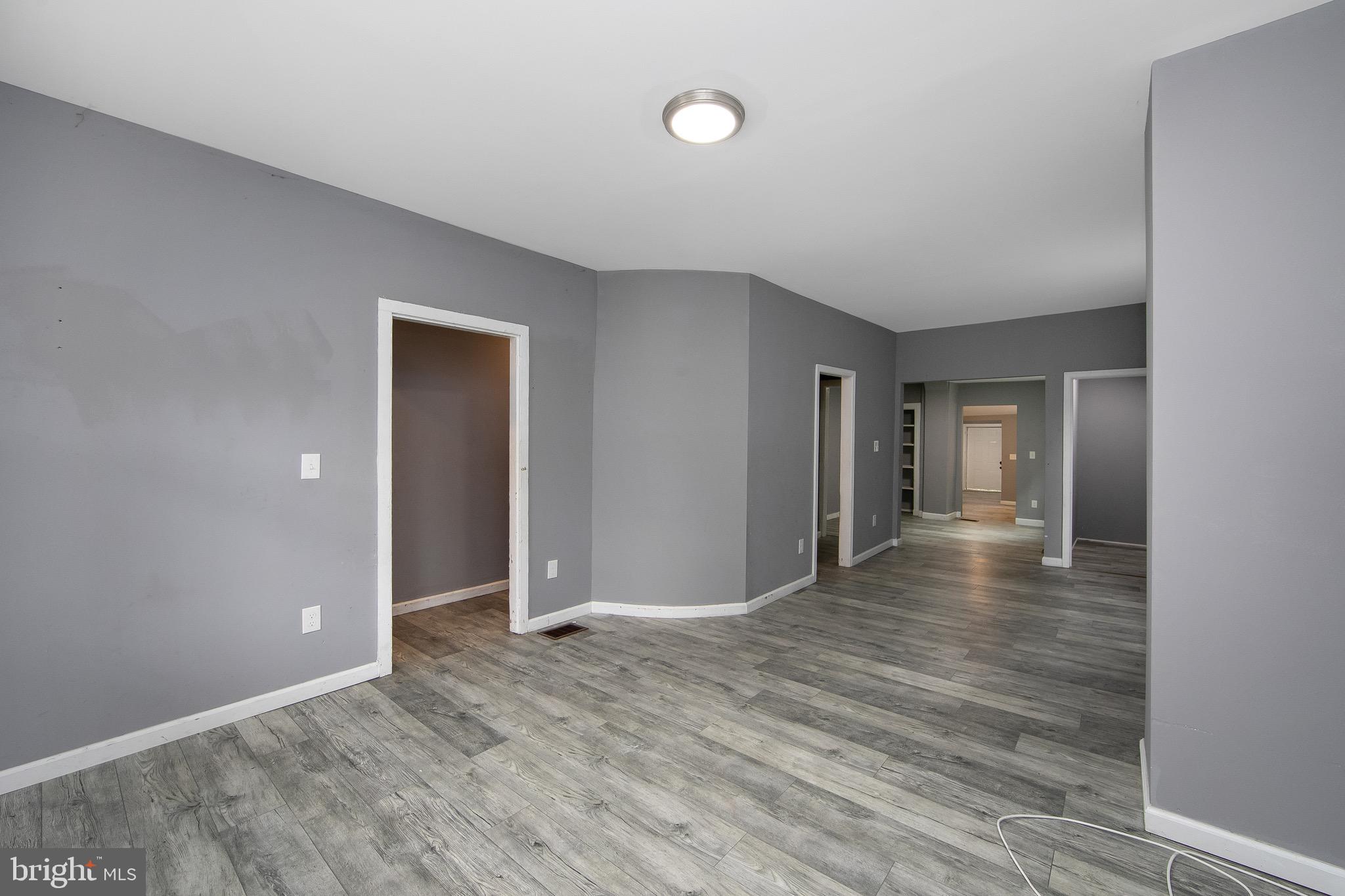 133 East Federal Street Burlington, NJ 08016 - Photo 7 of 43 wooden floor in an empty room with a window