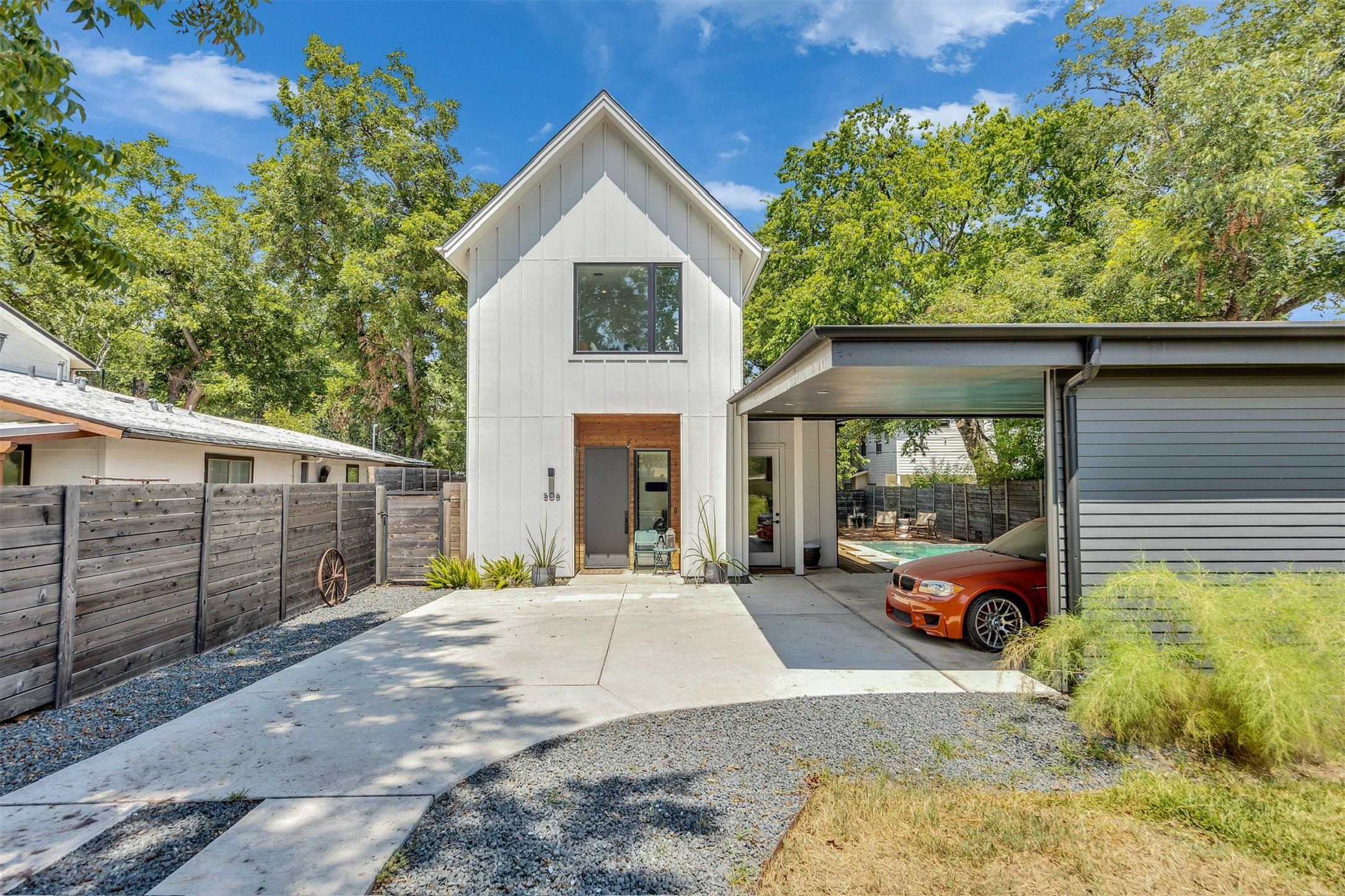 506 Powell Circle Austin, TX 78704 - Photo 11 of 39 a front view of a house with garden