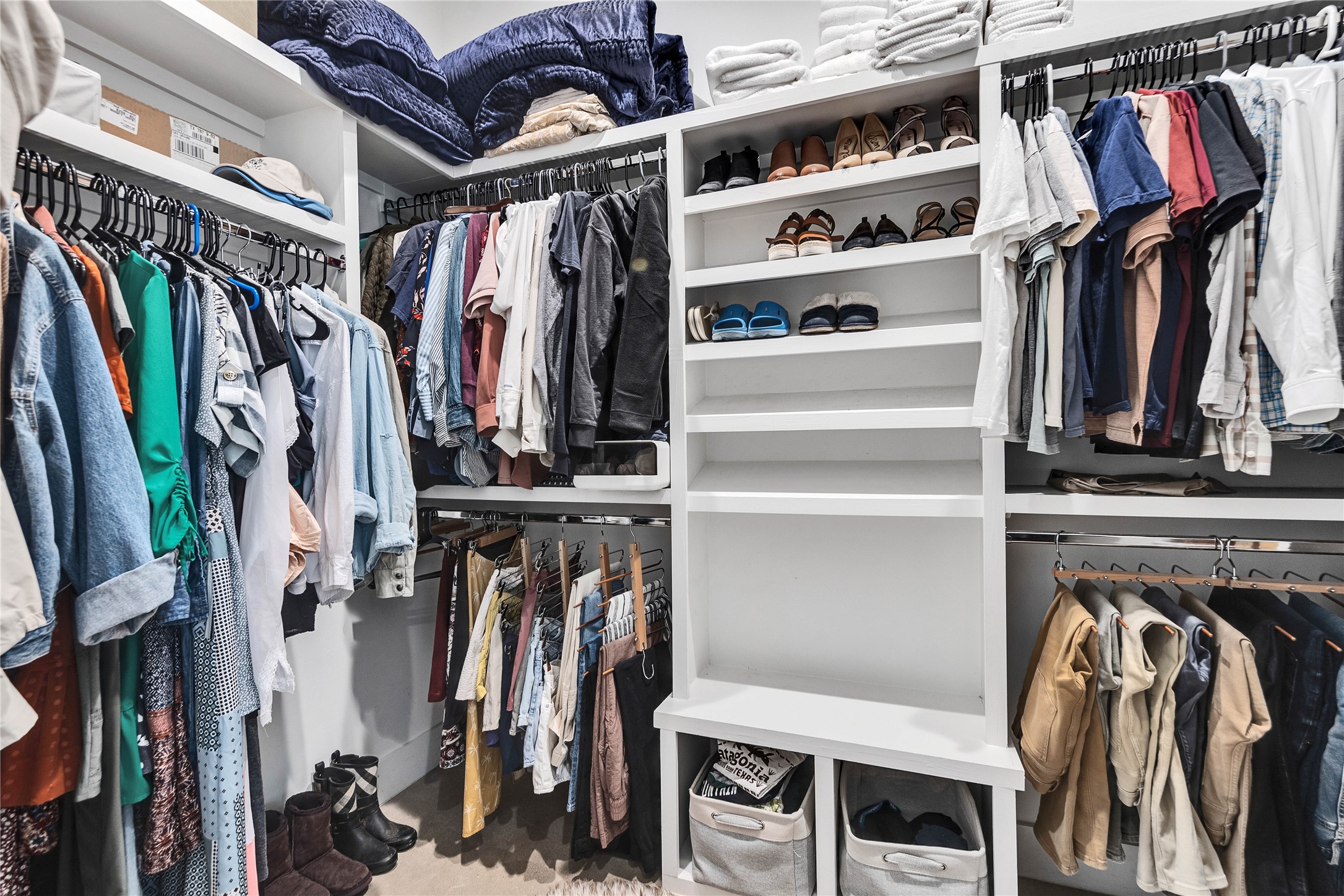 506 Powell Circle Austin, TX 78704 - Photo 25 of 39 a view of walk in closet with clothes and shoes