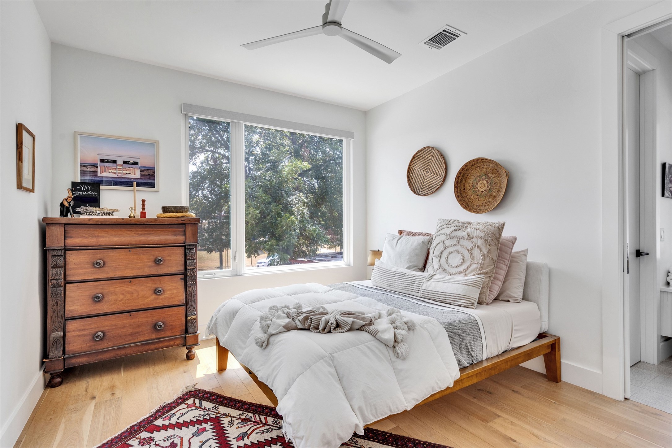 506 Powell Circle Austin, TX 78704 - Photo 32 of 39 a bedroom with a bed and a window