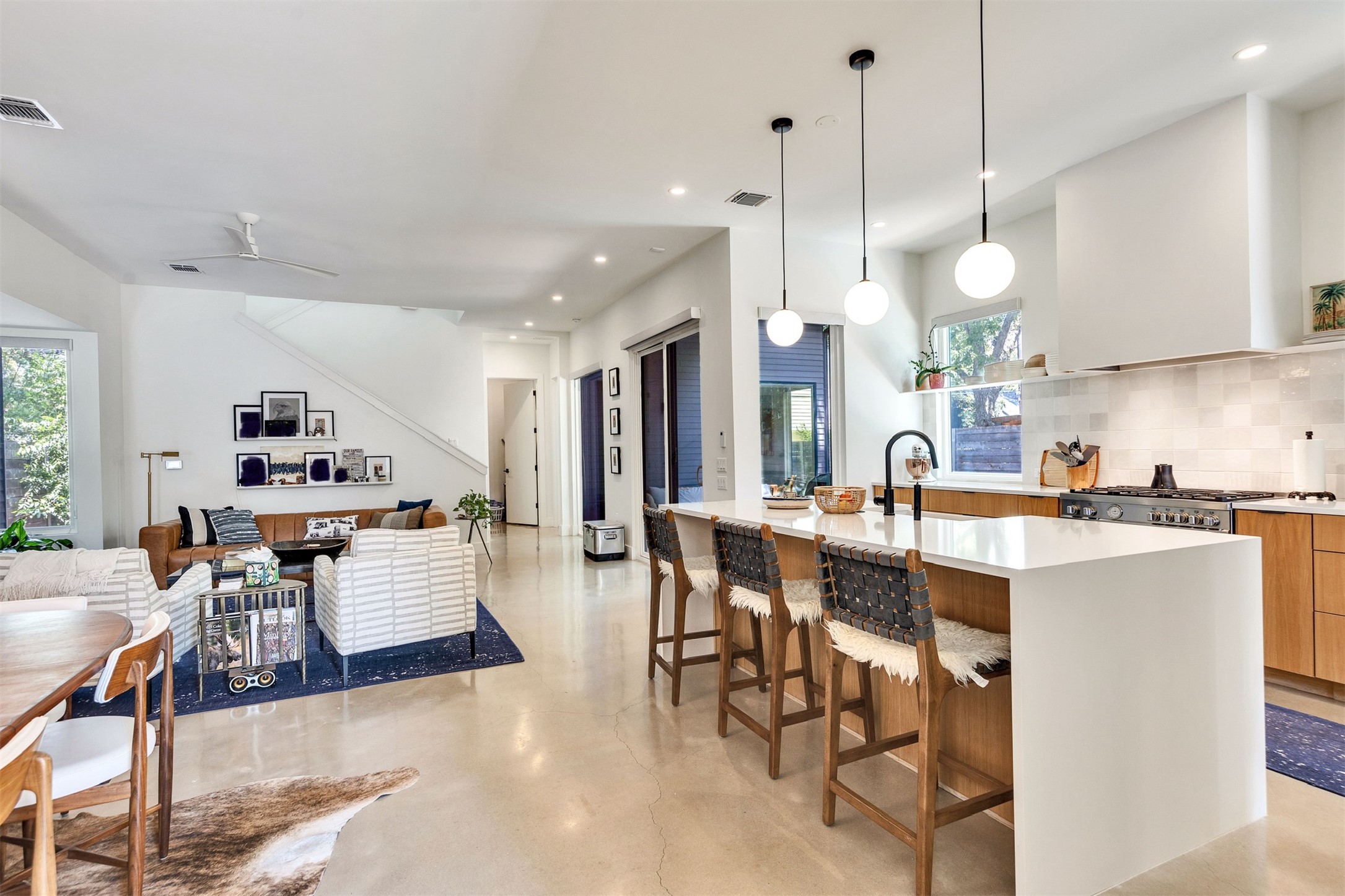 506 Powell Circle Austin, TX 78704 - Photo 39 of 39 a large kitchen with a table and chairs