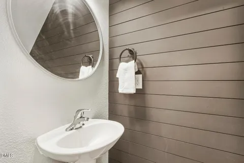 a view of an empty room with stairs and toys